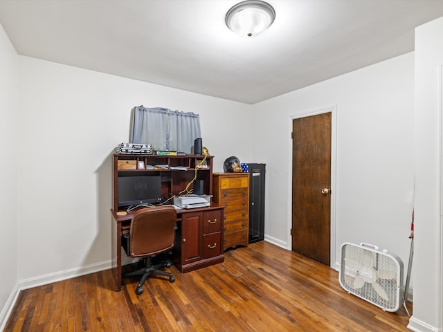 office featuring baseboards and dark wood-style floors