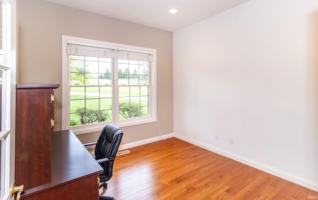 office with light wood-style flooring, baseboards, and recessed lighting