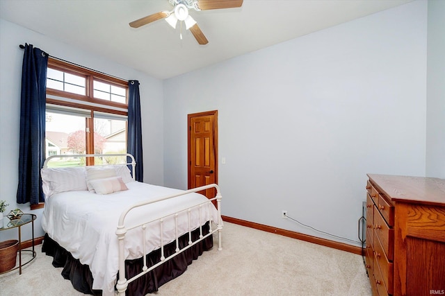4052 Diamond Row, Greenwood, IN 46143 - bedroom featuring light carpet, baseboards, and ceiling fan