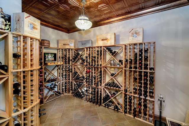 4052 Diamond Row, Greenwood, IN 46143 - wine area with tile patterned floors, ornamental molding, and an ornate ceiling