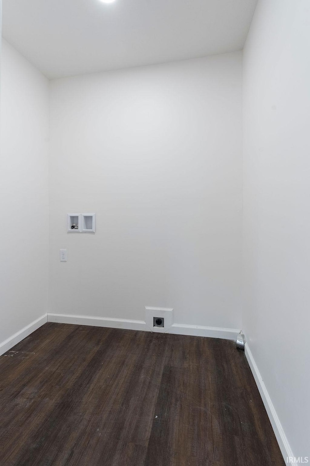 laundry area featuring electric dryer hookup, laundry area, washer hookup, dark wood finished floors, and baseboards