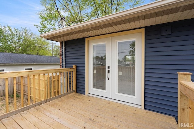wooden deck featuring french doors