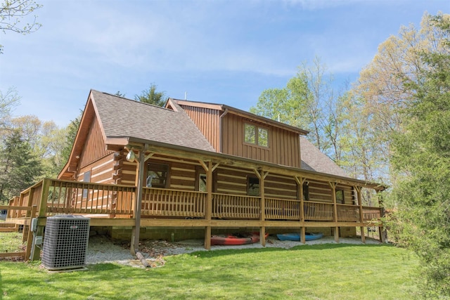 6705 S Shields Ridge Rd, Bloomington, IN 47401 - back of property with central air condition unit, a shingled roof, board and batten siding, and log exterior
