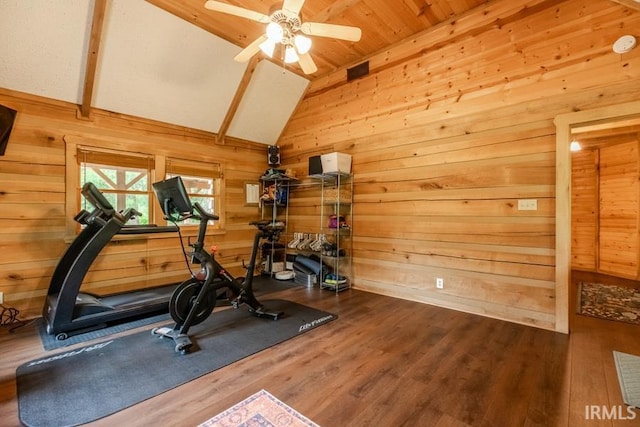 6705 S Shields Ridge Rd, Bloomington, IN 47401 - workout area with vaulted ceiling, wood walls, wood finished floors, and a ceiling fan