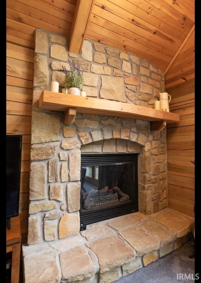 6705 S Shields Ridge Rd, Bloomington, IN 47401 - interior details with wooden walls, a fireplace, and wooden ceiling