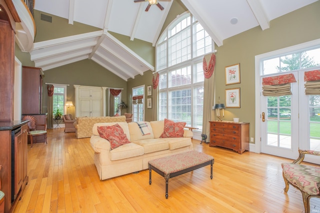13 Rolling Ridge Ct, Jasper, IN 47546 - living room with a ceiling fan, a wealth of natural light, light wood finished floors, high vaulted ceiling, and beam ceiling