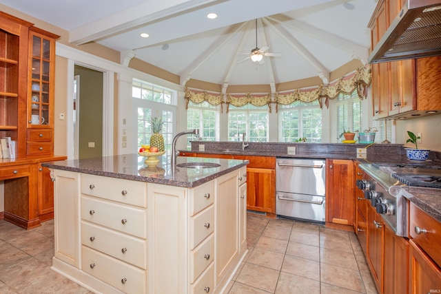 13 Rolling Ridge Ct, Jasper, IN 47546 - kitchen featuring a ceiling fan, under cabinet range hood, a sink, dark stone countertops, and appliances with stainless steel finishes