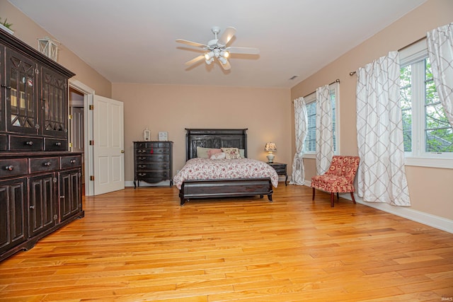 13 Rolling Ridge Ct, Jasper, IN 47546 - bedroom with baseboards, ceiling fan, light wood finished floors, and visible vents