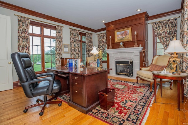 13 Rolling Ridge Ct, Jasper, IN 47546 - office with crown molding, recessed lighting, a glass covered fireplace, and light wood-style floors