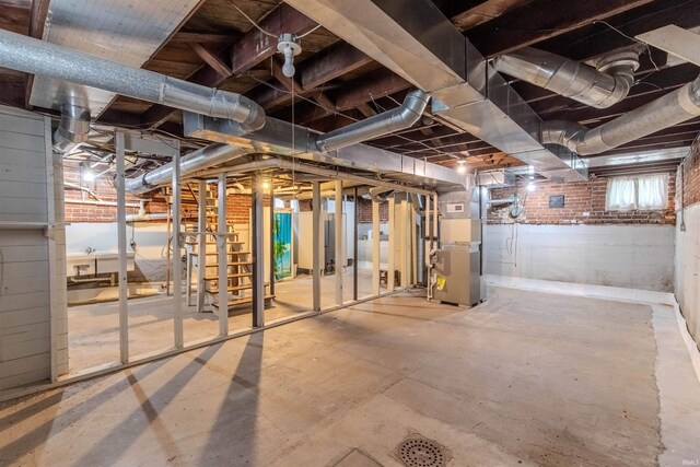 306 S Main St, Topeka, IN 46571 - below grade area featuring heating unit