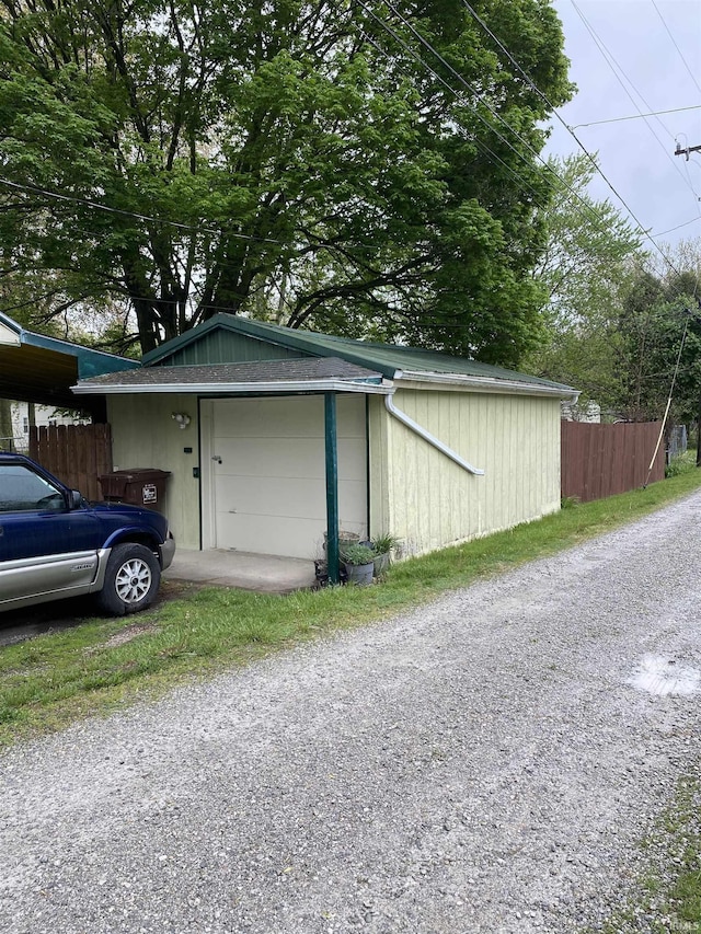 garage featuring fence