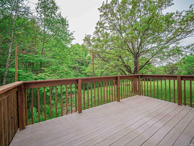 deck featuring a yard