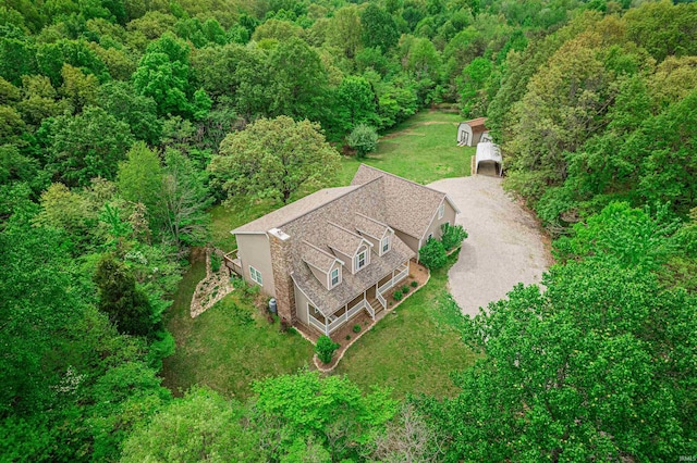 aerial view with a wooded view