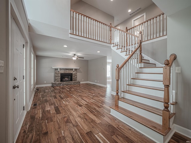 interior space featuring baseboards, ceiling fan, and wood finished floors