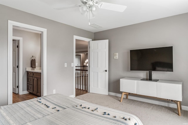 bedroom featuring baseboards, visible vents, and a ceiling fan