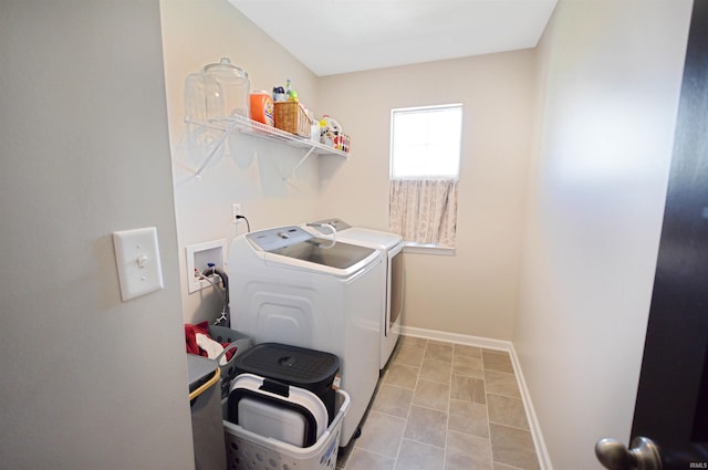 6357 Spirea Ct, West Lafayette, IN 47906 - laundry area with baseboards, laundry area, light tile patterned floors, and washer and dryer