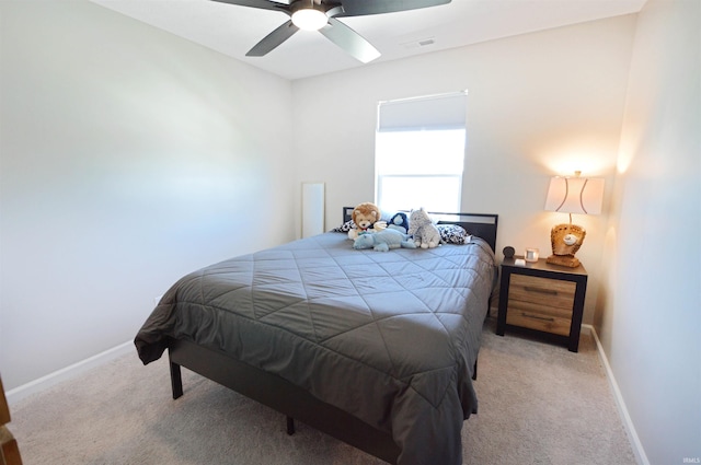 6357 Spirea Ct, West Lafayette, IN 47906 - bedroom with carpet, visible vents, baseboards, and ceiling fan