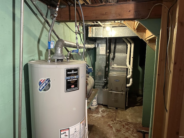 utility room featuring water heater