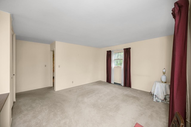 spare room featuring carpet flooring