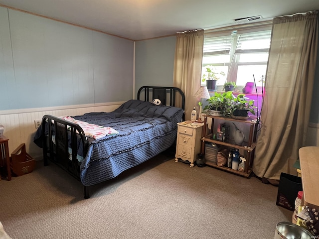 bedroom featuring visible vents and carpet floors
