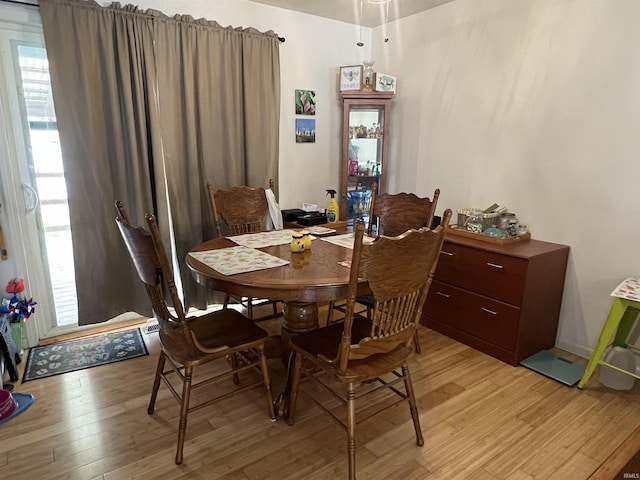 dining room featuring light wood finished floors