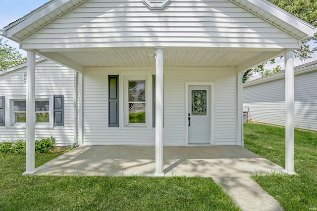 615 Washington St, Rockport, IN 47635 - doorway to property featuring a lawn and a porch