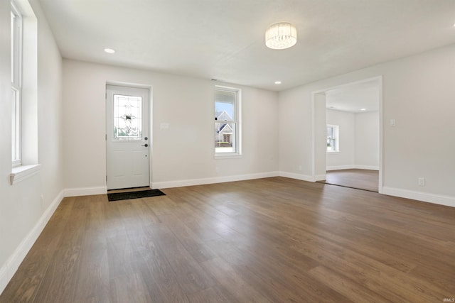 615 Washington St, Rockport, IN 47635 - entrance foyer with baseboards, a wealth of natural light, recessed lighting, and wood finished floors