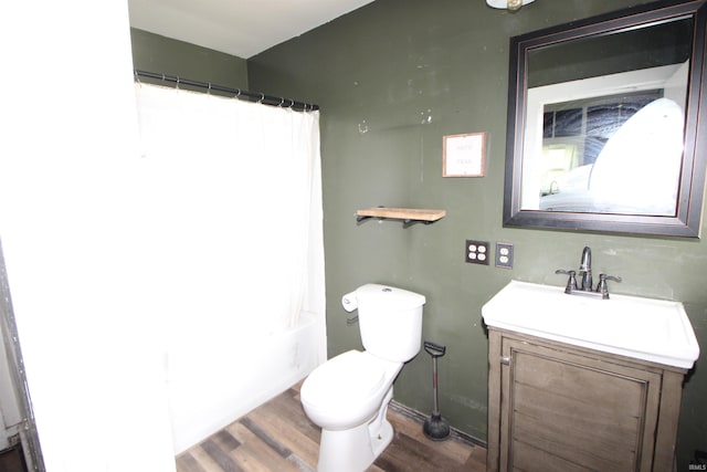 29623 County Road 6th Rd, Elkhart, IN 46514 - full bath with vanity, wood finished floors, toilet, baseboards, and shower / bath combo