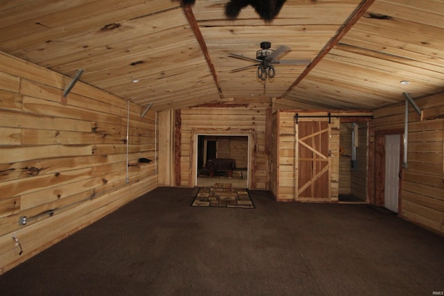 29623 County Road 6th Rd, Elkhart, IN 46514 - unfurnished living room featuring wooden walls, wooden ceiling, lofted ceiling, carpet flooring, and a ceiling fan