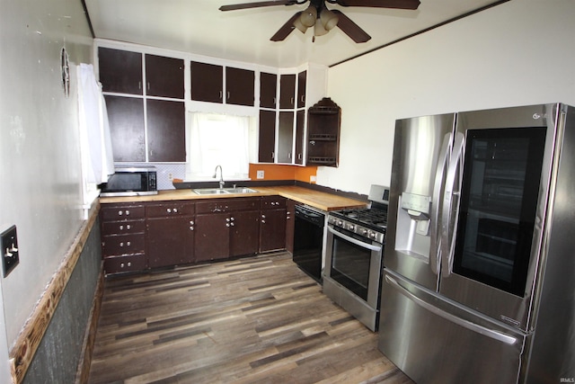 29623 County Road 6th Rd, Elkhart, IN 46514 - kitchen with appliances with stainless steel finishes, a sink, open shelves, dark wood-type flooring, and ceiling fan
