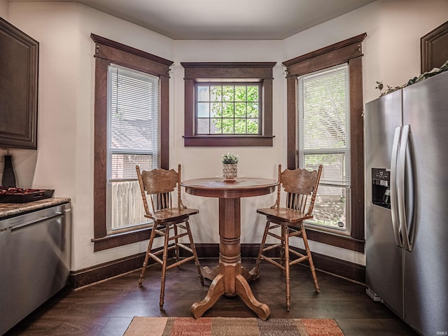 108 S Church St, Owensville, IN 47665 - dining area with baseboards and dark wood-style floors