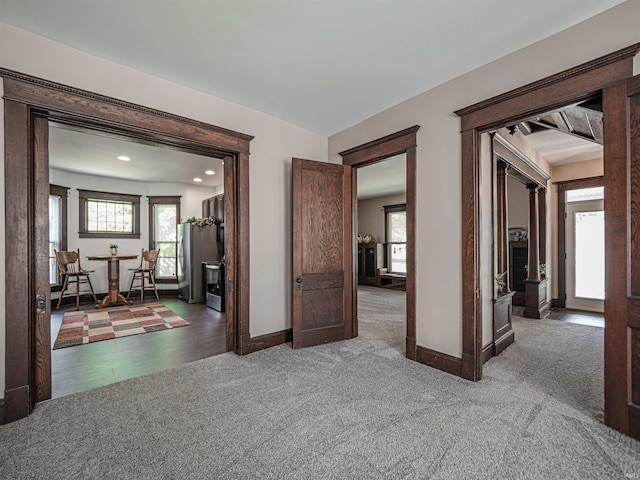 108 S Church St, Owensville, IN 47665 - interior space featuring carpet, baseboards, and a healthy amount of sunlight