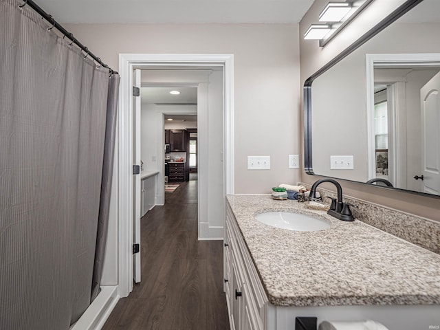 108 S Church St, Owensville, IN 47665 - full bath featuring baseboards, wood finished floors, vanity, and recessed lighting