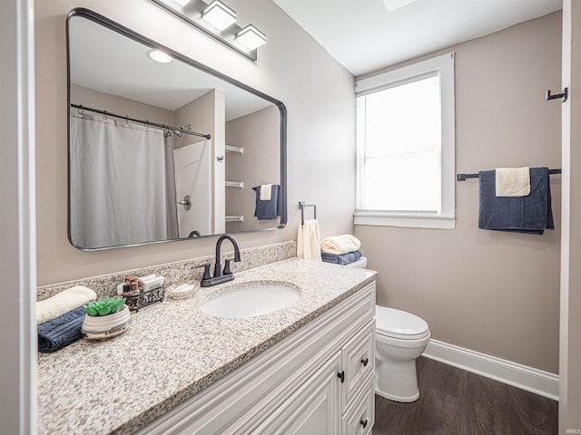 108 S Church St, Owensville, IN 47665 - full bathroom featuring toilet, wood finished floors, vanity, a shower with shower curtain, and baseboards