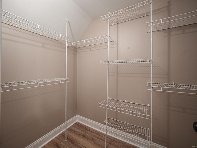 108 S Church St, Owensville, IN 47665 - spacious closet with vaulted ceiling and wood finished floors