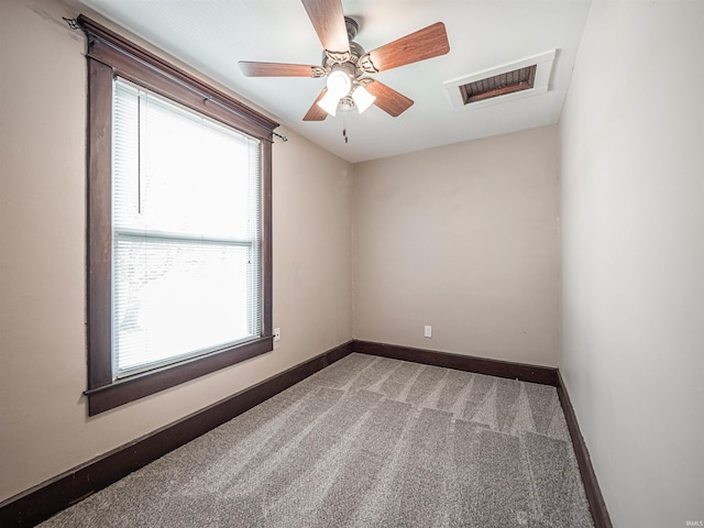 108 S Church St, Owensville, IN 47665 - carpeted spare room featuring baseboards, plenty of natural light, and visible vents