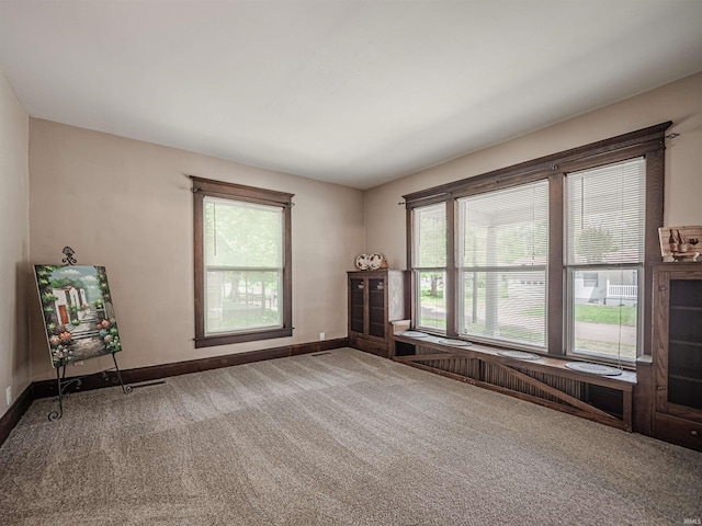 108 S Church St, Owensville, IN 47665 - carpeted empty room featuring baseboards