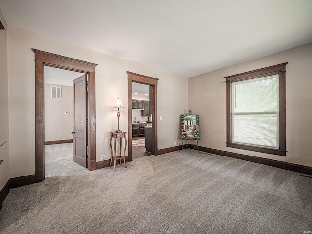 108 S Church St, Owensville, IN 47665 - carpeted empty room with baseboards and visible vents