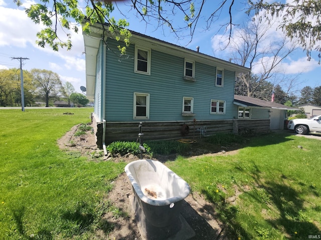 view of property exterior featuring a yard
