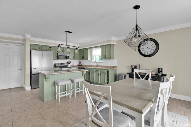 dining space featuring light tile patterned floors, a chandelier, baseboards, and ornamental molding