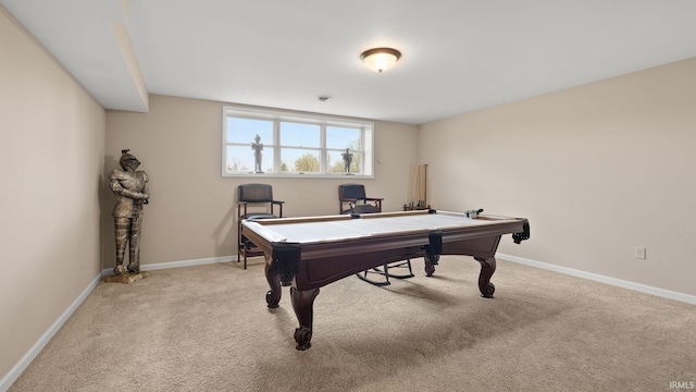 rec room with light carpet and baseboards