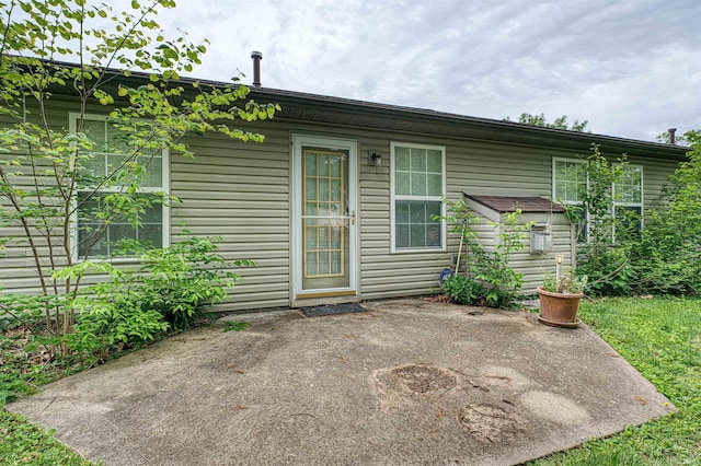 back of house featuring a patio