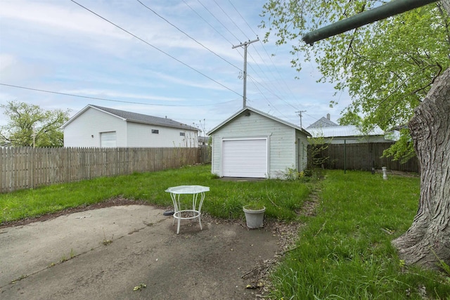 1116 Christyann St, Mishawaka, IN 46545 - view of yard featuring an outdoor structure, a patio area, a shed, and a fenced backyard