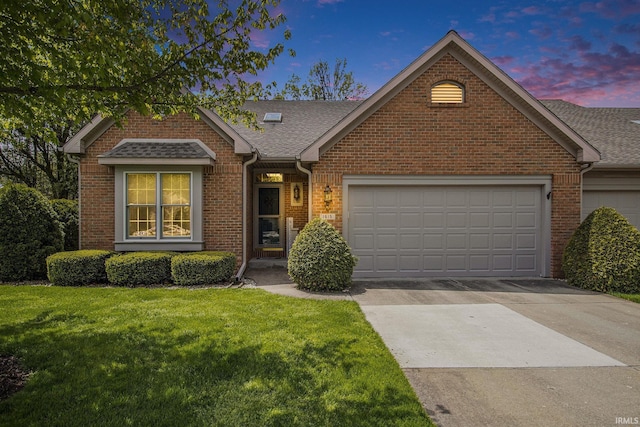 view of front of home with an attached garage, brick siding, driveway, and roof with shingles