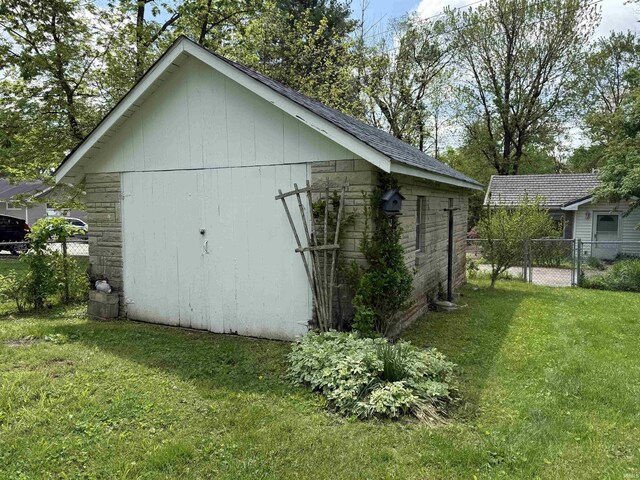 1406 E Hillside Dr, Bloomington, IN 47401 - view of outbuilding featuring an outbuilding and fence