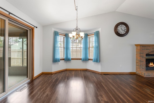 104 S Line St, South Whitley, IN 46787 - unfurnished dining area featuring a healthy amount of sunlight, lofted ceiling, visible vents, and dark wood finished floors
