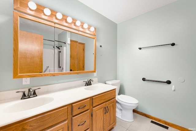 104 S Line St, South Whitley, IN 46787 - full bath with toilet, tile patterned flooring, double vanity, and a sink