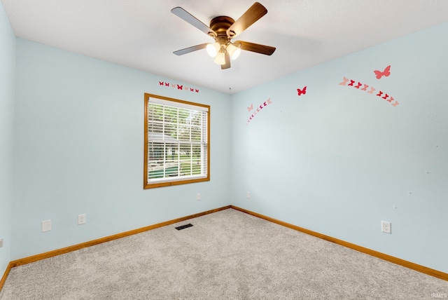 104 S Line St, South Whitley, IN 46787 - unfurnished room with baseboards, ceiling fan, and visible vents