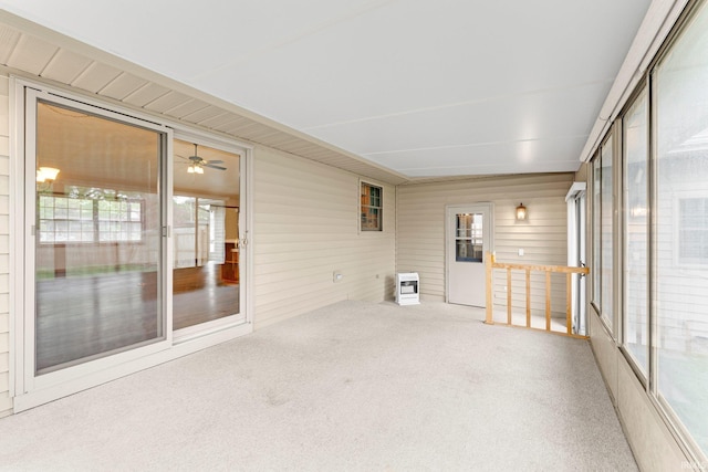 104 S Line St, South Whitley, IN 46787 - unfurnished sunroom featuring a ceiling fan