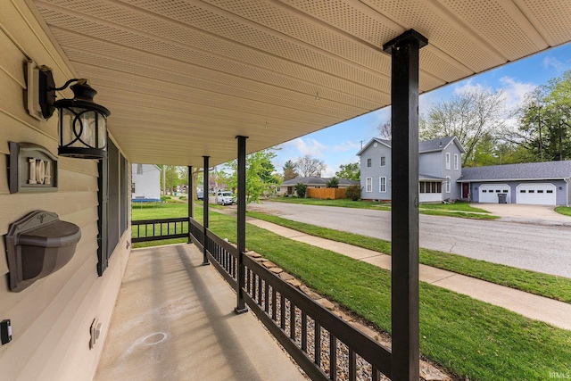 104 S Line St, South Whitley, IN 46787 - view of patio / terrace featuring a porch and a residential view